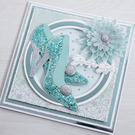 Learn how to make this beautiful blue and teal sparkling stiletto greetings card with this simple and easy tutorial from Chloes Creative Cards.