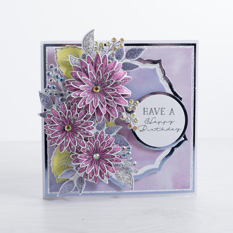 Pretty purple dahlia flowers with glitter encrusted foliage leaves - a beautiful birthday card.