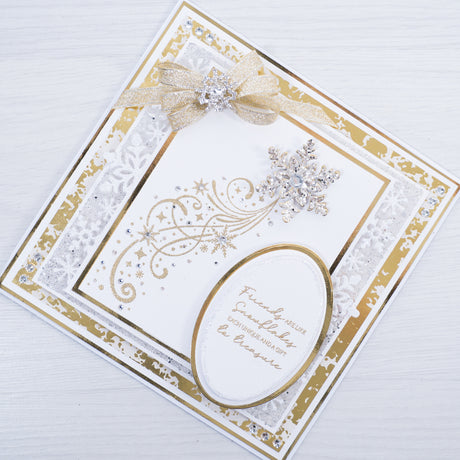 Learn how to create this silver and gold swirly snowflake Christmas card using products from Chloes Creative Cards. This free step-by-step tutorial shows you how to make a quick and easy Christmas card at home using our new Snowflake Stamp and Die Set.