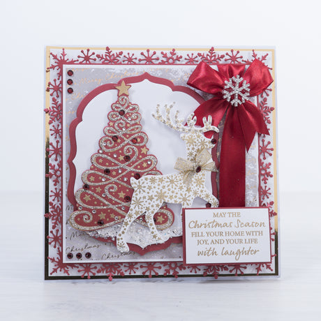 Learn how to make this traditional regal style red and White Christmas card featuring a sparkling Christmas Tree and snowflake embellished reindeer using products from Chloes Creative Cards.