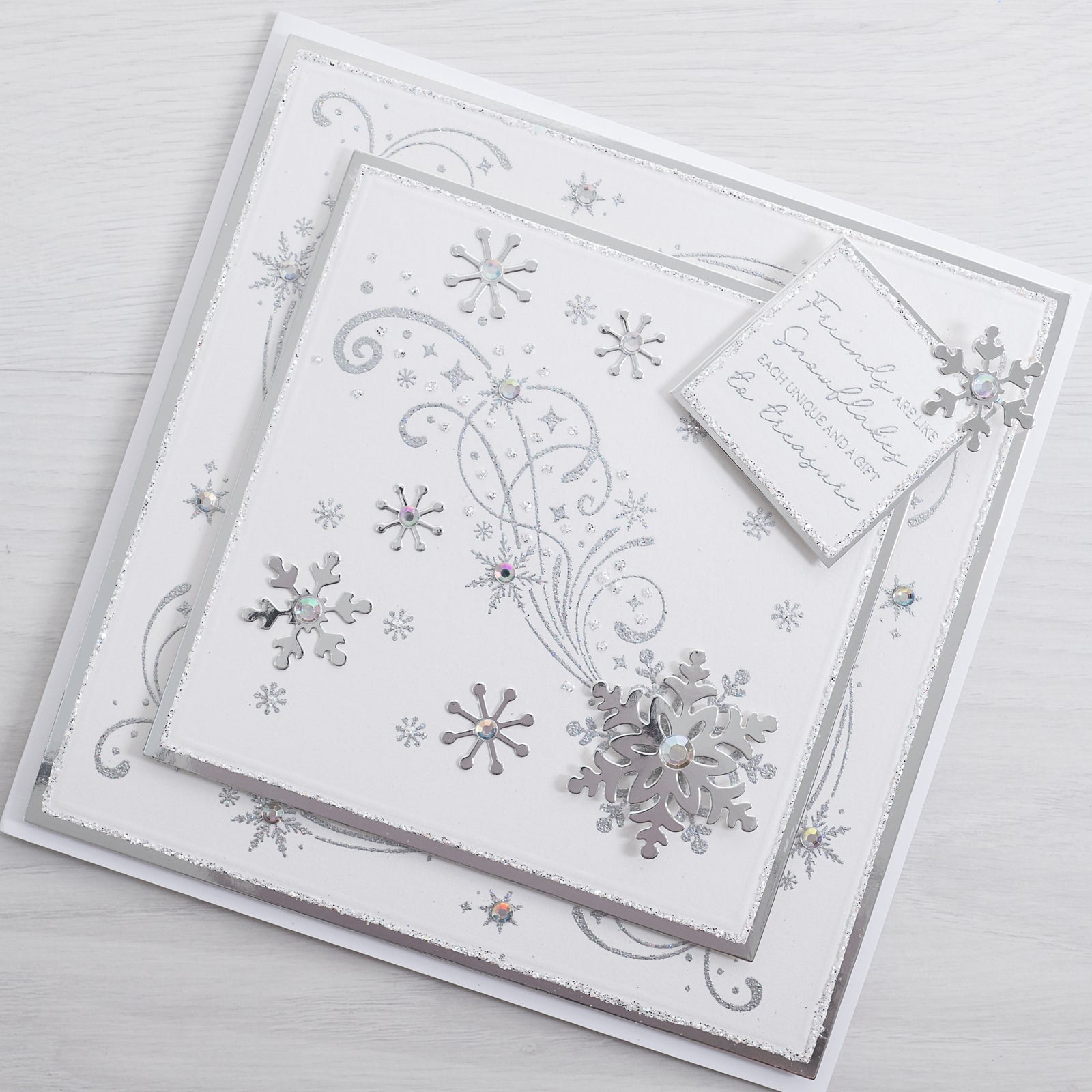 Step into Christmas with this truly magical Swirly Snowflake Flurry Card - perfect for those of you looking to make quick and easy cards at home this Christmas Time.