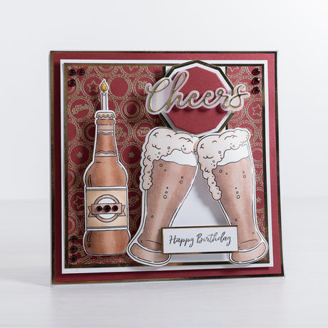 Create a quick and easy birthday card using our free card making tutorial featuring red and gold patterned paper layers, embossing and our new Birthday Beers 3D stamped elements.