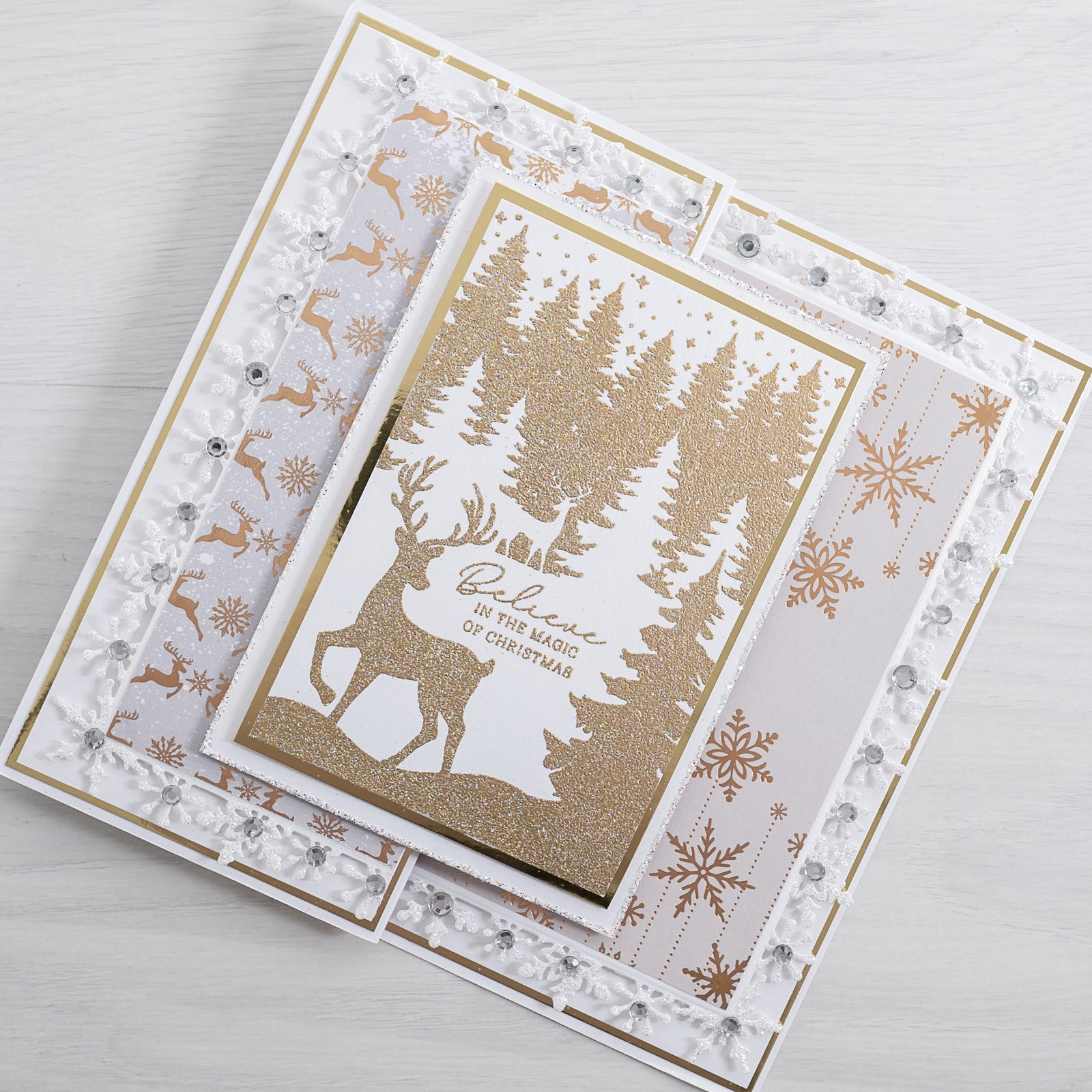 Learn how to make your own gold Christmas Card at home with this quick and easy tutorial from Chloes Creative Cards.
