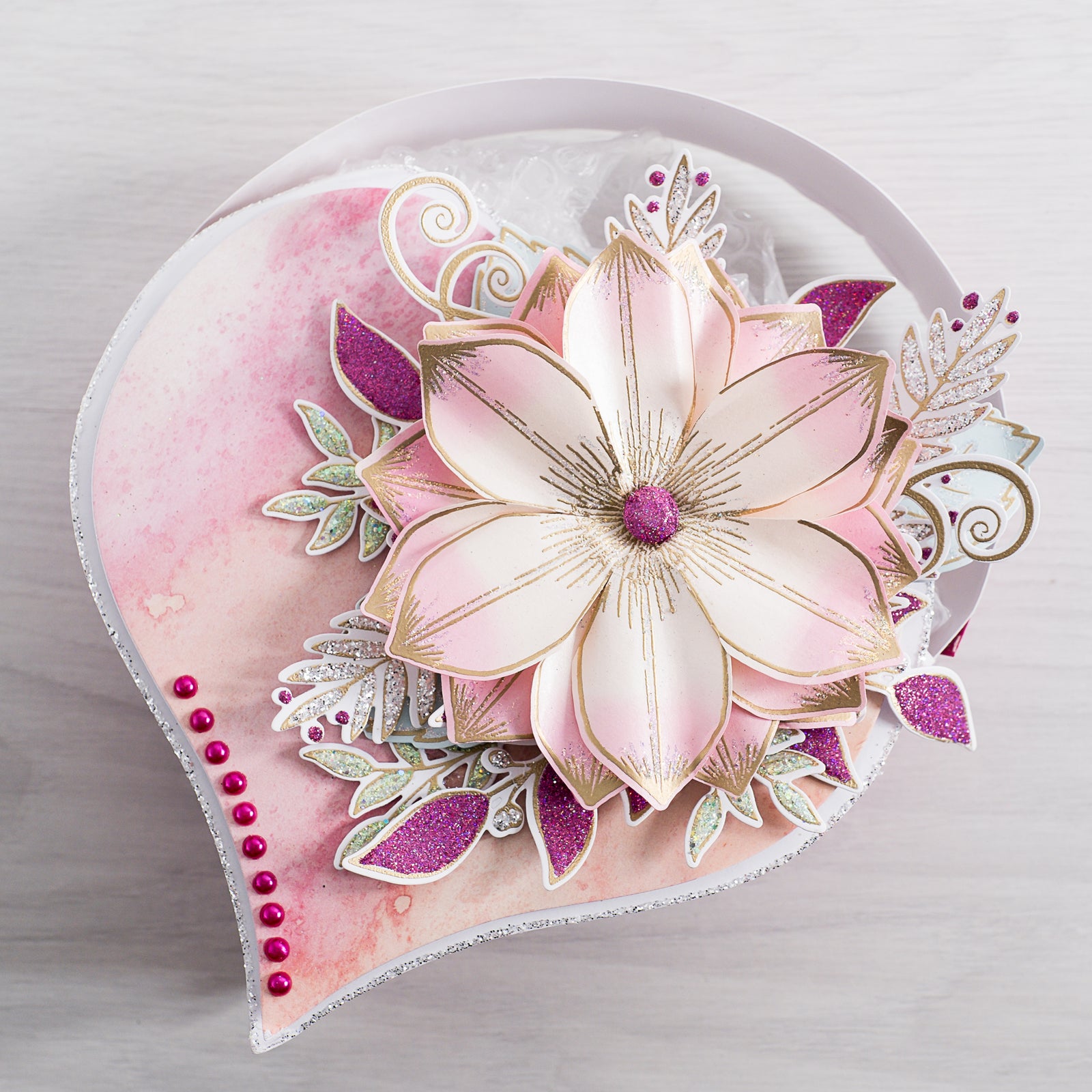 Learn how to make this beautiful pink heart-shaped bag at home using products from Chloes Creative Cards