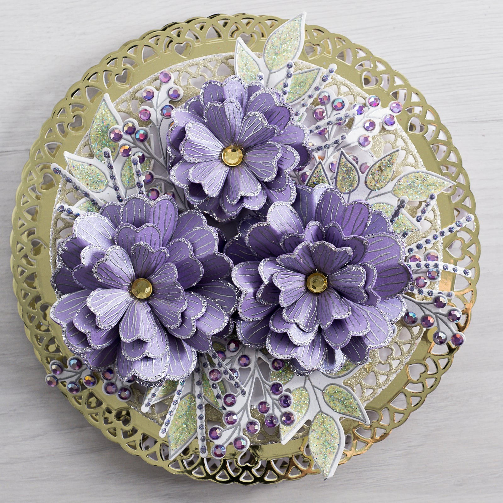 Learn how to create this lovely lace card at home using our new lacy circle metal die sets to create a beautiful base card to feature these gorgeous Posy flower 3D paper flowers.