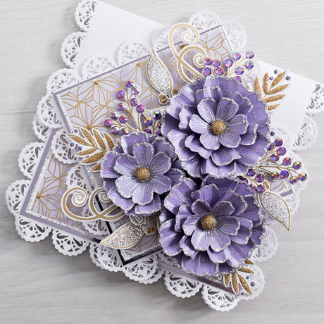 Learn how to create this beautiful purple and white lace cut-out layer card using our new metal lace cutting dies and our 3D Summer Flower stamps from Chloes Creative Cards.